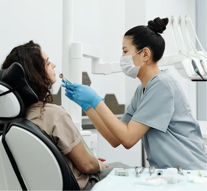 Dental professional with a patient